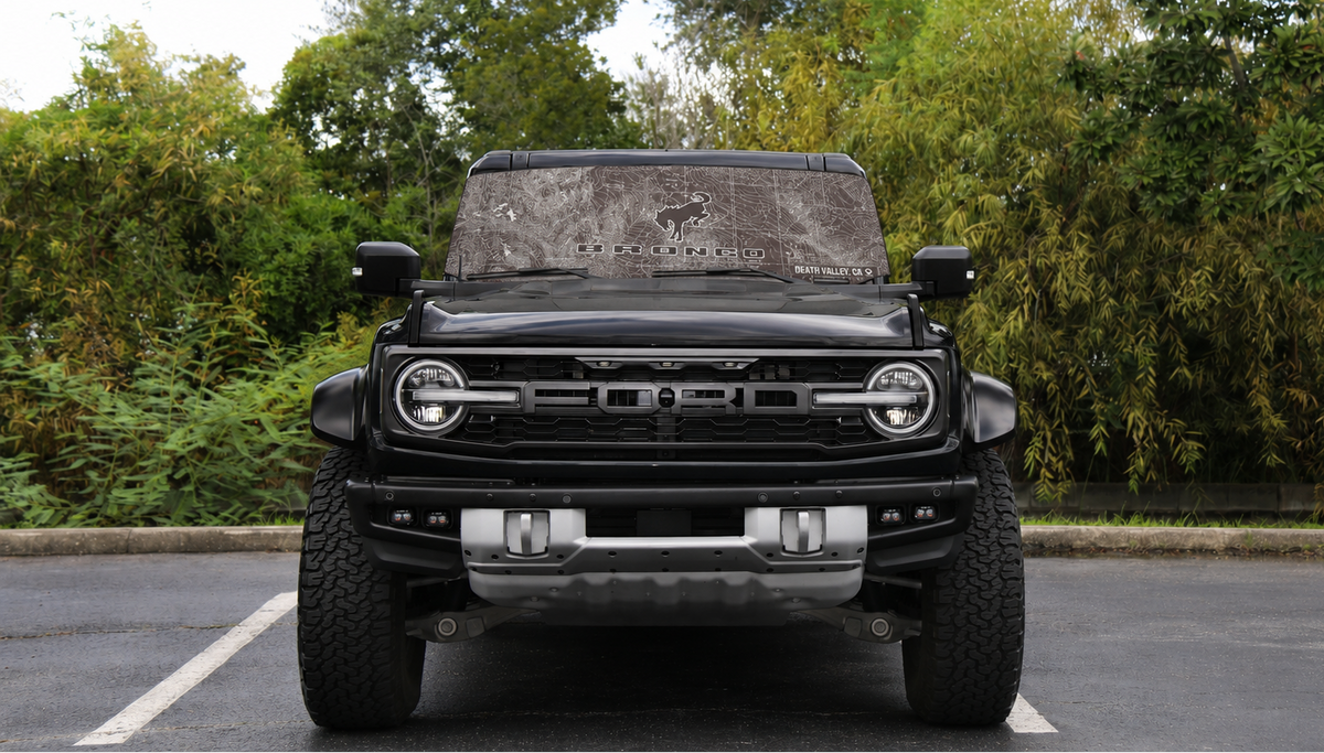 Black Ford Bronco Raptor parked, front view | Spider Web Shade