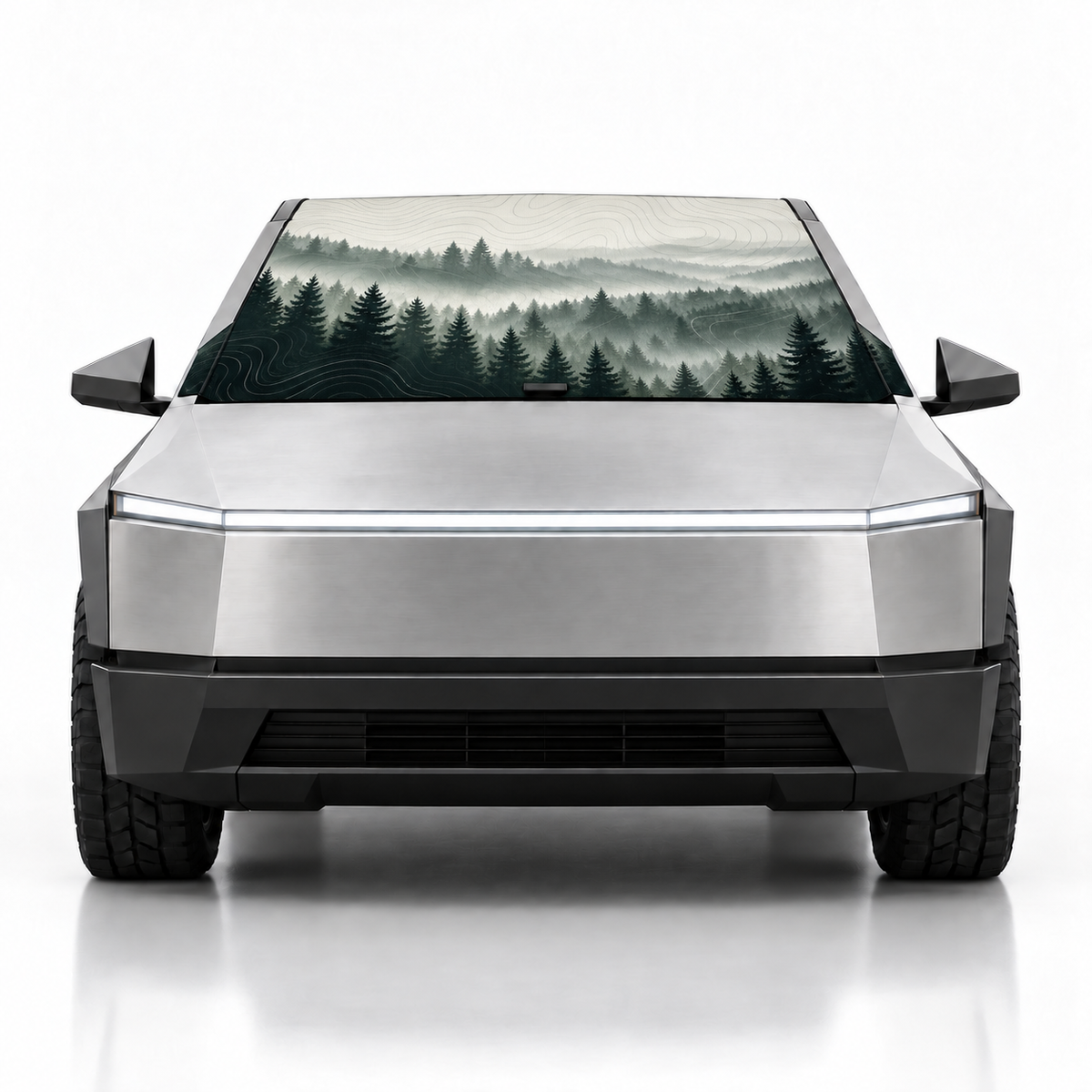 Front view of silver Tesla Cybertruck with Misty Pines print (misty pine forest) Solar Shield on windshield | Spider Web Shade