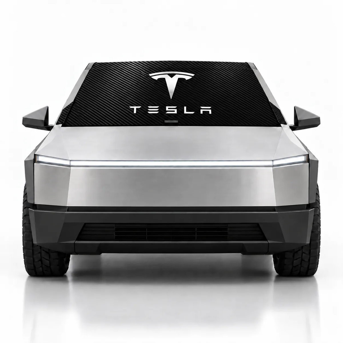 Front view of silver Tesla Cybertruck with Tesla Carbon Edition print (black carbon pattern with Tesla logo and wordmark) Solar Shield on windshield | Spider Web Shade