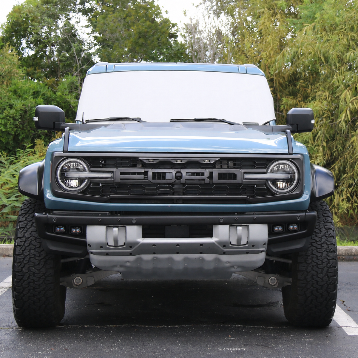White Spider Web Shade Solar Shield on Ford Bronco Raptor windshield, front view - custom fit Ford Bronco 2021-2026 sun shade