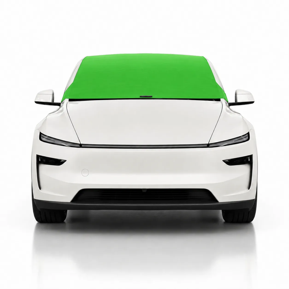 Front view of white Tesla Model Y with green solid color Solar Shield on windshield | Spider Web Shade