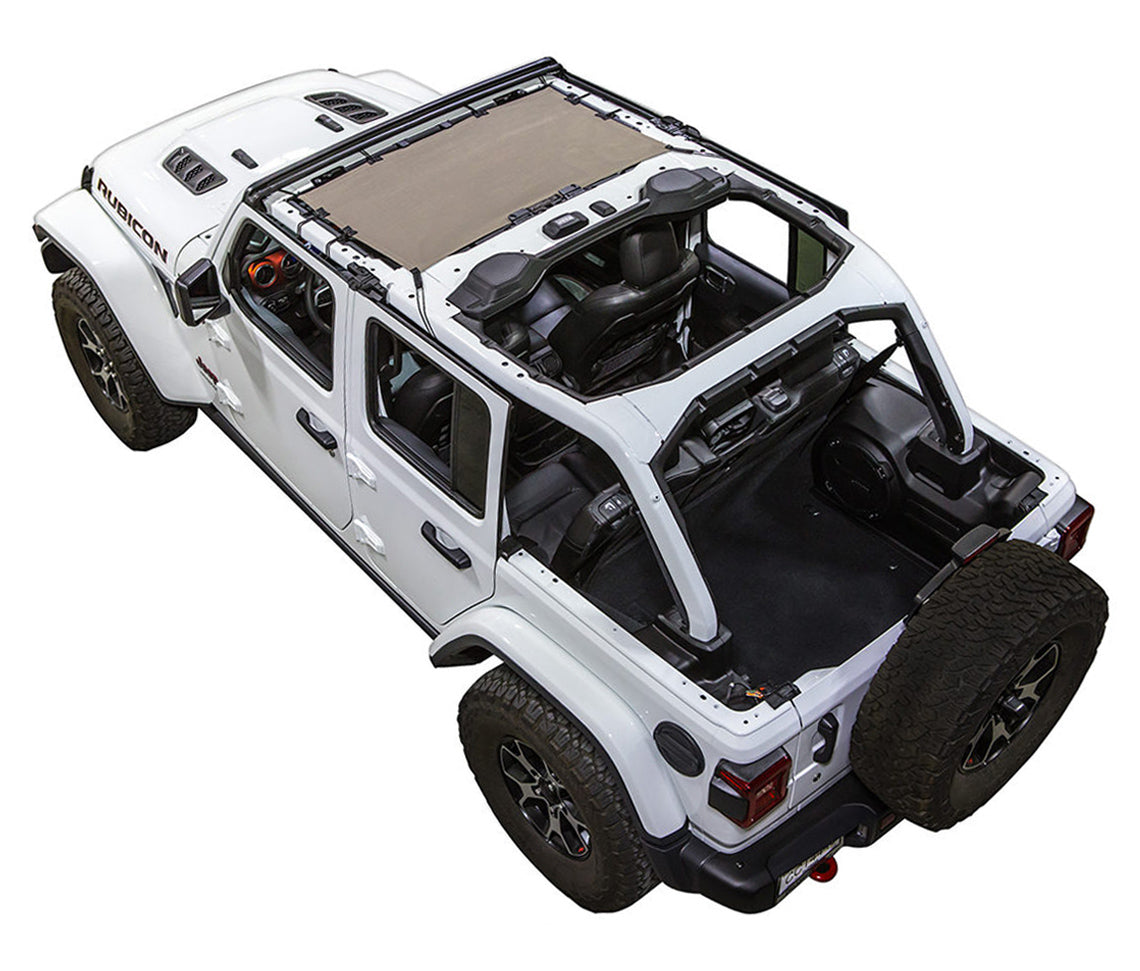 White Rubicon JL four door Jeep with tan SPIDERWEBSHADE shade on top that only covers front seat riders from windshield frame extending to the rear to the sound bar.