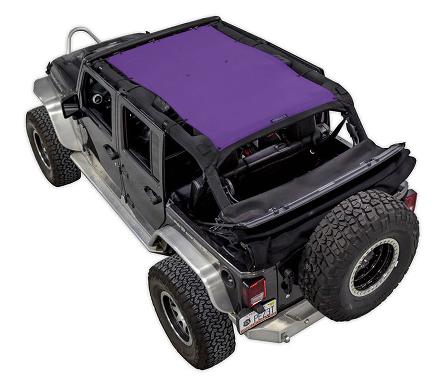Black Rubicon JK four door Jeep with purple SPIDERWEBSHADE shade on top that covers front and rear passenger seats. 
