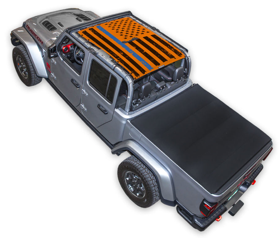 Silver Gladiator JT four door Jeep with Distressed Thin Blue Line tactical Flag orange SPIDERWEBSHADE shade on top that covers front and rear passenger seats.