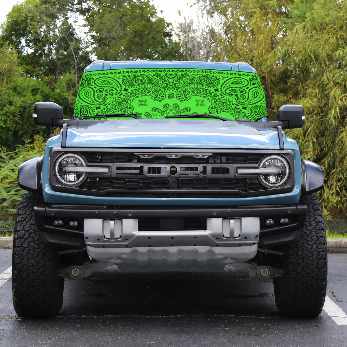 Ford Bronco Raptor front view with green bandana print Solar Shield on windshield | Spider Web Shade
