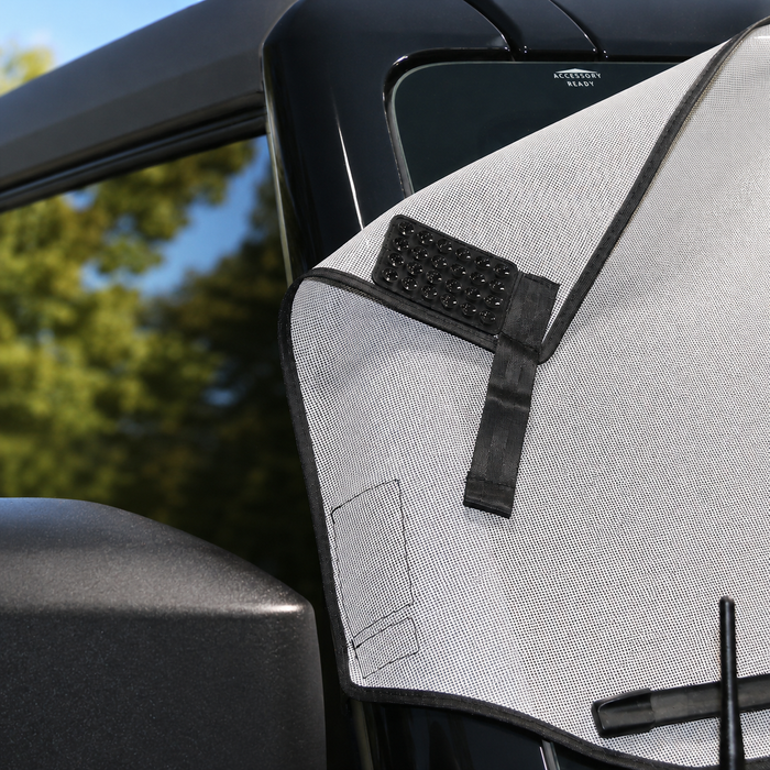 Close-up of Solar Shield attachment strap on Ford Bronco windshield frame | Spider Web Shade