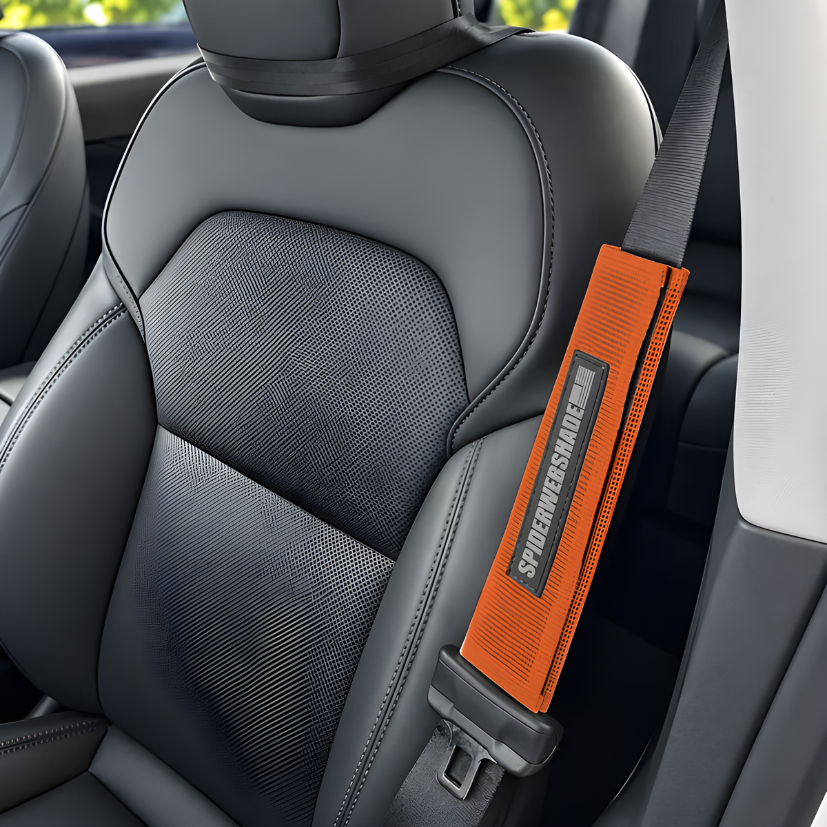 Tesla seatbelt silencer in Orange