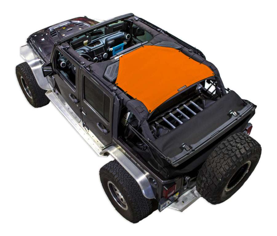 Black Rubicon JK four door Jeep with orange SPIDERWEBSHADE shade on top that only covers rear passenger seats from the sound bar to the back cross member of the roll cage.