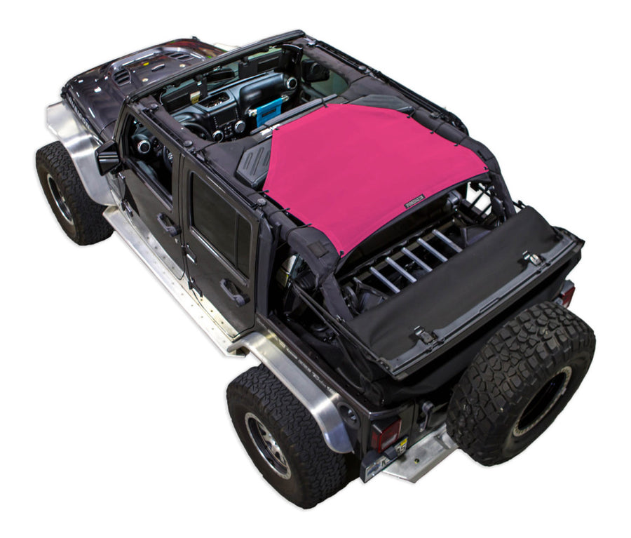 Black Rubicon JK four door Jeep with pink SPIDERWEBSHADE shade on top that only covers rear passenger seats from the sound bar to the back cross member of the roll cage.