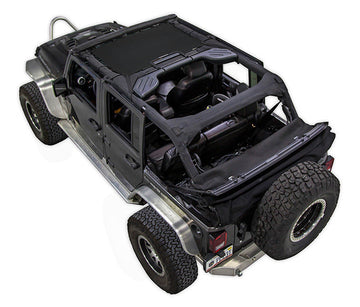 Black Rubicon JK four door Jeep with black SPIDERWEBSHADE shade on top that only covers front seat riders from windshield frame extending to the rear to the sound bar. 