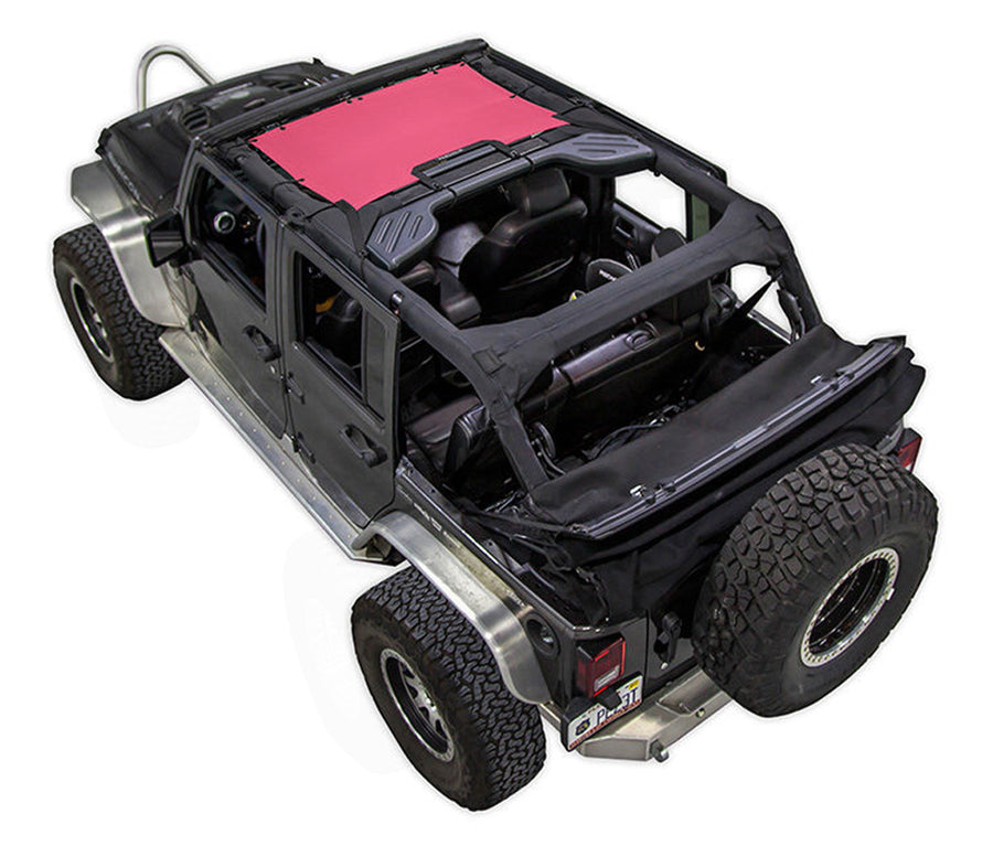 Black Rubicon JK four door Jeep with pink SPIDERWEBSHADE shade on top that only covers front seat riders from windshield frame extending to the rear to the sound bar. 