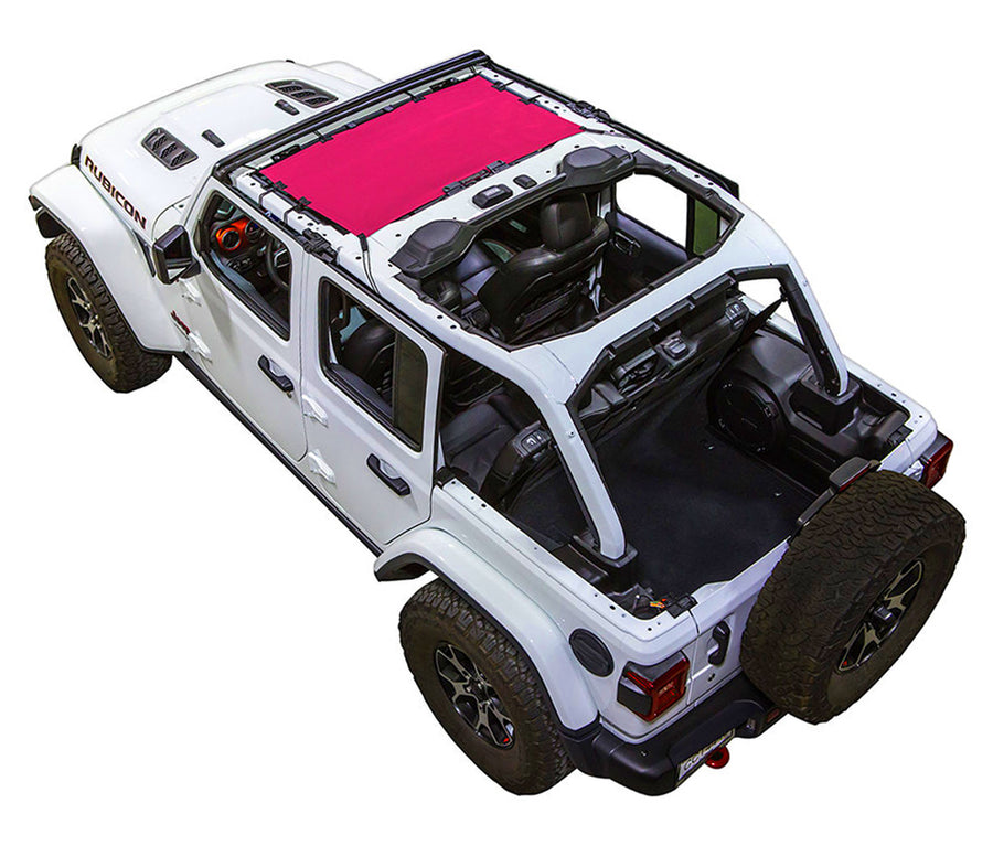 White Rubicon JL four door Jeep with pink SPIDERWEBSHADE shade on top that only covers front seat riders from windshield frame extending to the rear to the sound bar. 