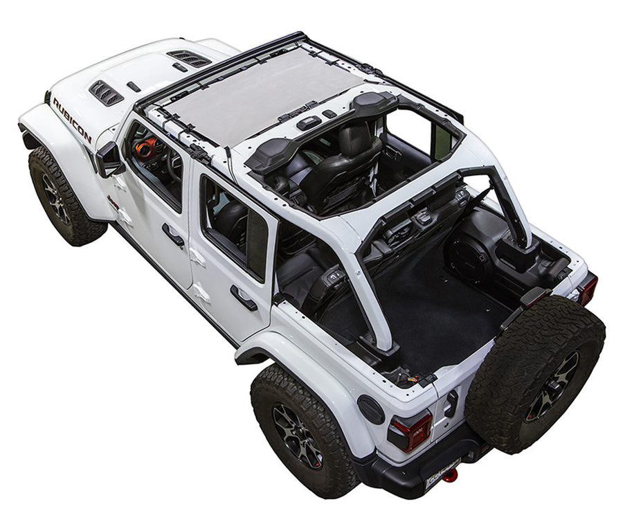 White Rubicon JL four door Jeep with white SPIDERWEBSHADE shade on top that only covers front seat riders from windshield frame extending to the rear to the sound bar. 