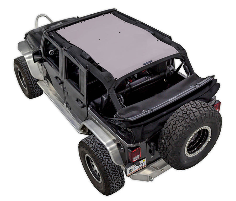 Black Rubicon JK four door Jeep with Grey SPIDERWEBSHADE shade on top that covers front and rear passenger seats. 