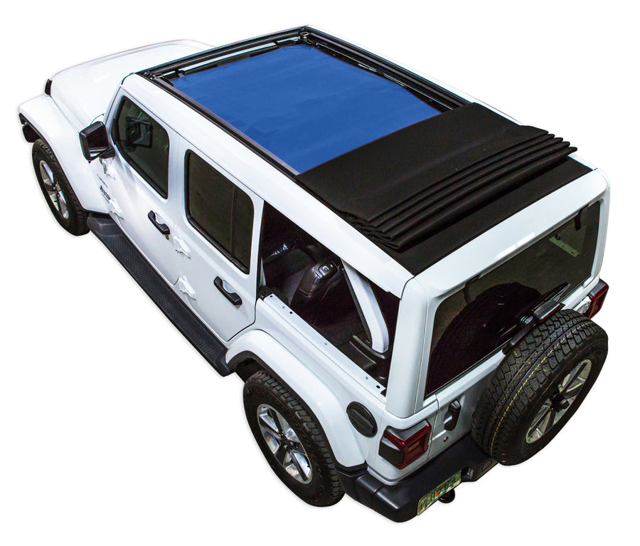 White  JL four door Power Top Jeep with blue SPIDERWEBSHADE shade on top that covers front and rear passenger seats.