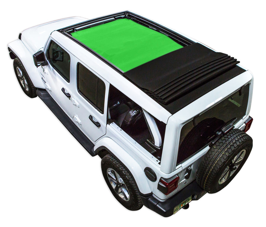 White  JL four door Power Top Jeep with green SPIDERWEBSHADE shade on top that covers front and rear passenger seats.