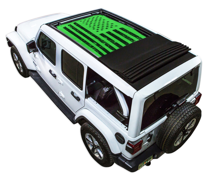 White JL four door Power Top Jeep with Distressed Tactical American Flag green SPIDERWEBSHADE shade on top that covers front and rear passenger seats.