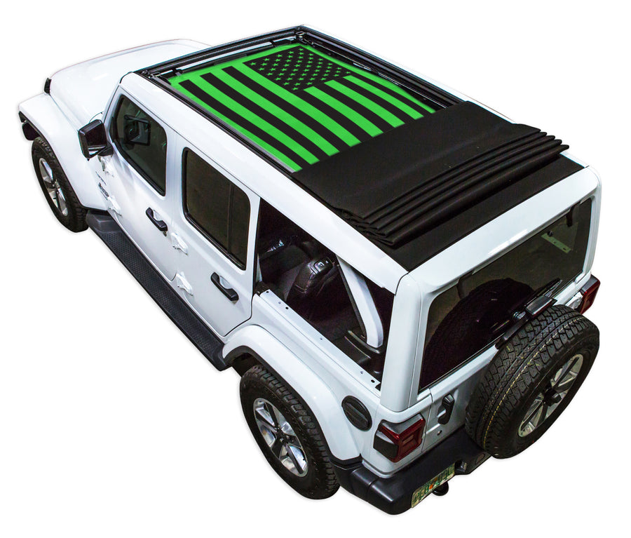 White JL four door Power Top Jeep with Solid Tactical American Flag green SPIDERWEBSHADE shade on top that covers front and rear passenger seats.