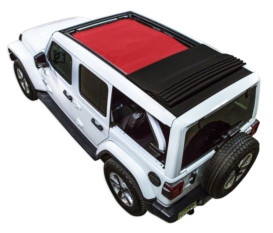 White JL four door Power Top Jeep with red SPIDERWEBSHADE shade on top that covers front and rear passenger seats.