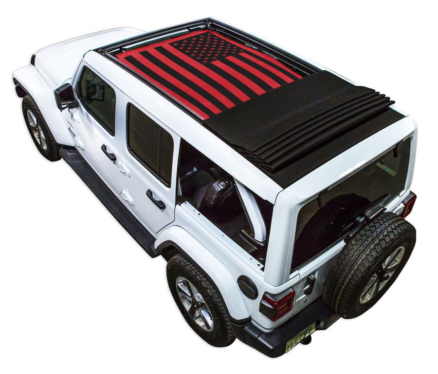 White JL four door Power Top Jeep with Solid Tactical American Flag red SPIDERWEBSHADE shade on top that covers front and rear passenger seats.