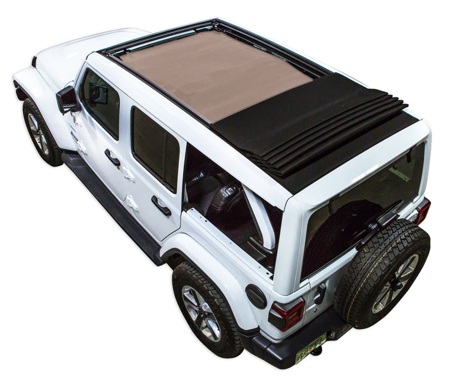 White JL four door Power Top Jeep with tan SPIDERWEBSHADE shade on top that covers front and rear passenger seats.