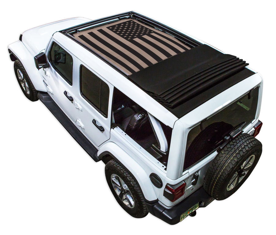 White JL four door Power Top Jeep with Solid Tactical American Flag tan SPIDERWEBSHADE shade on top that covers front and rear passenger seats.