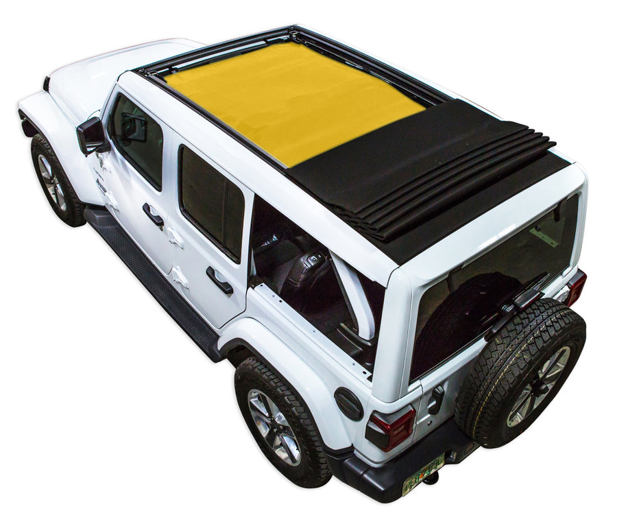 White JL four door Power Top Jeep with yellow SPIDERWEBSHADE shade on top that covers front and rear passenger seats.