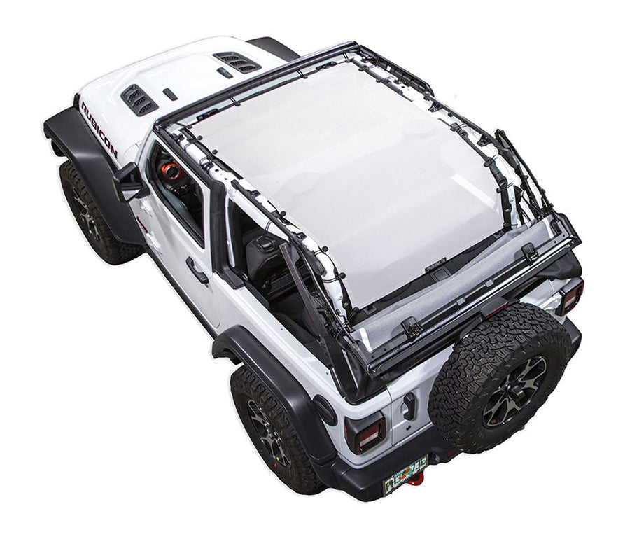 White Rubicon JL two door Jeep with white SPIDERWEBSHADE shade on top that covers entire roof of jeep and extends to roll cage /tailgate/ cargo area.