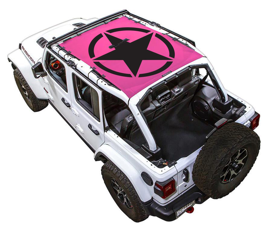 White Rubicon JL four door Jeep with Solid Oscar Mike pink SPIDERWEBSHADE shade on top that covers front and rear passenger seats.