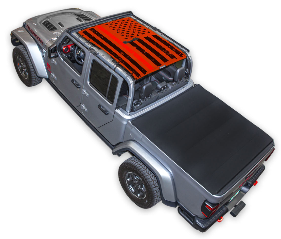 Silver Gladiator JT four door Jeep with Distressed Thin Red Line tactical Flag red SPIDERWEBSHADE shade on top that covers front and rear passenger seats.