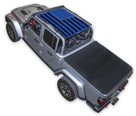 Silver Gladiator JT four door Jeep with Distressed tactical Flag Blue SPIDERWEBSHADE shade on top that covers front and rear passenger seats.