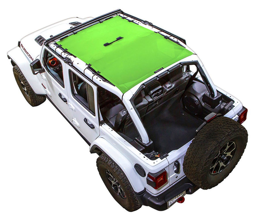 White Rubicon JL four door Jeep with green SPIDERWEBSHADE shade on top that covers front and rear passenger seats.