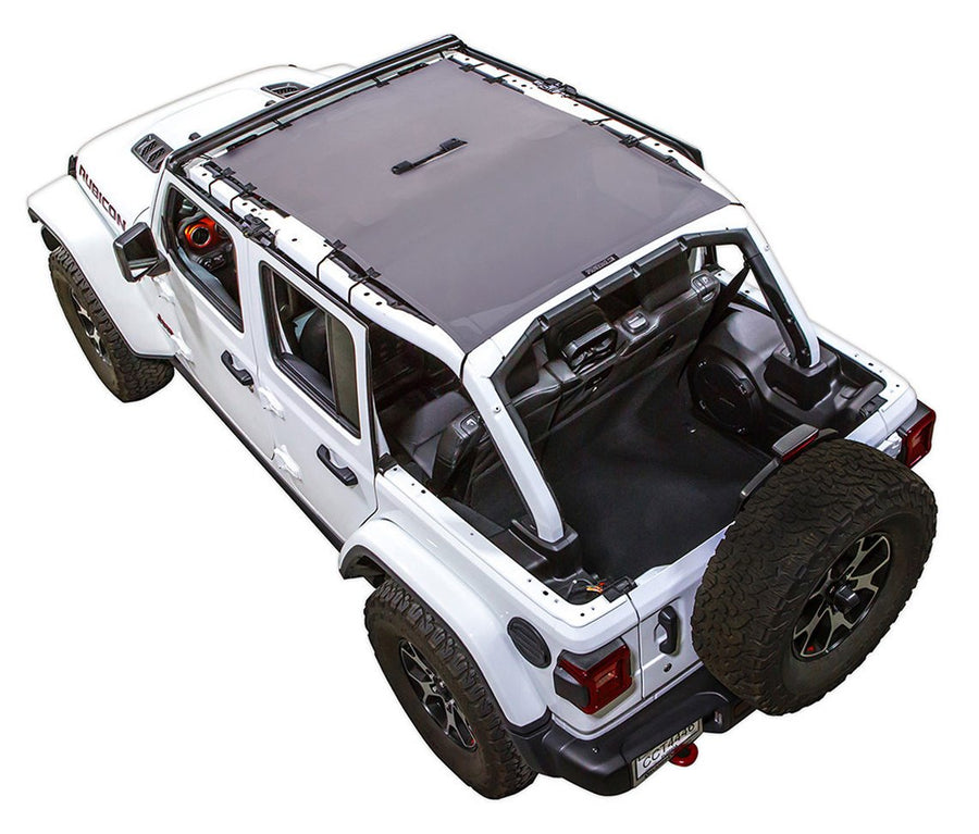 White Rubicon JL four door Jeep with grey  SPIDERWEBSHADE shade on top that covers front and rear passenger seats.