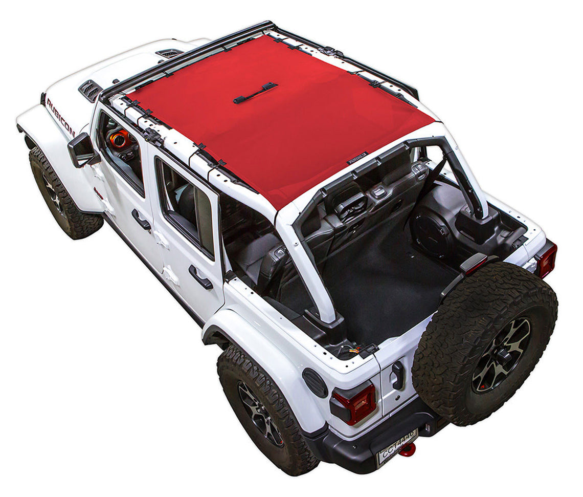 White Rubicon JL four door Jeep with red SPIDERWEBSHADE shade on top that covers front and rear passenger seats. 