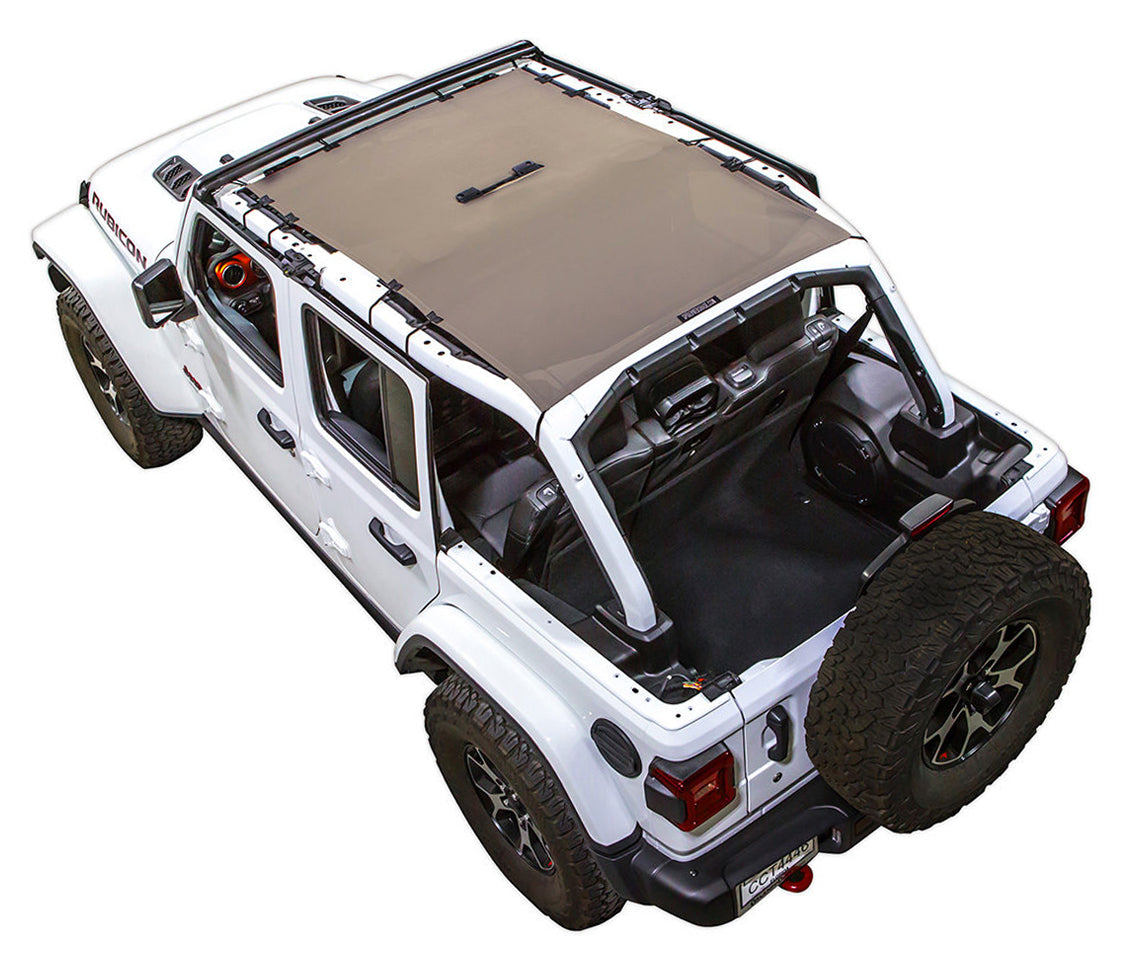 White Rubicon JL four door Jeep with tan SPIDERWEBSHADE shade on top that covers front and rear passenger seats. 
