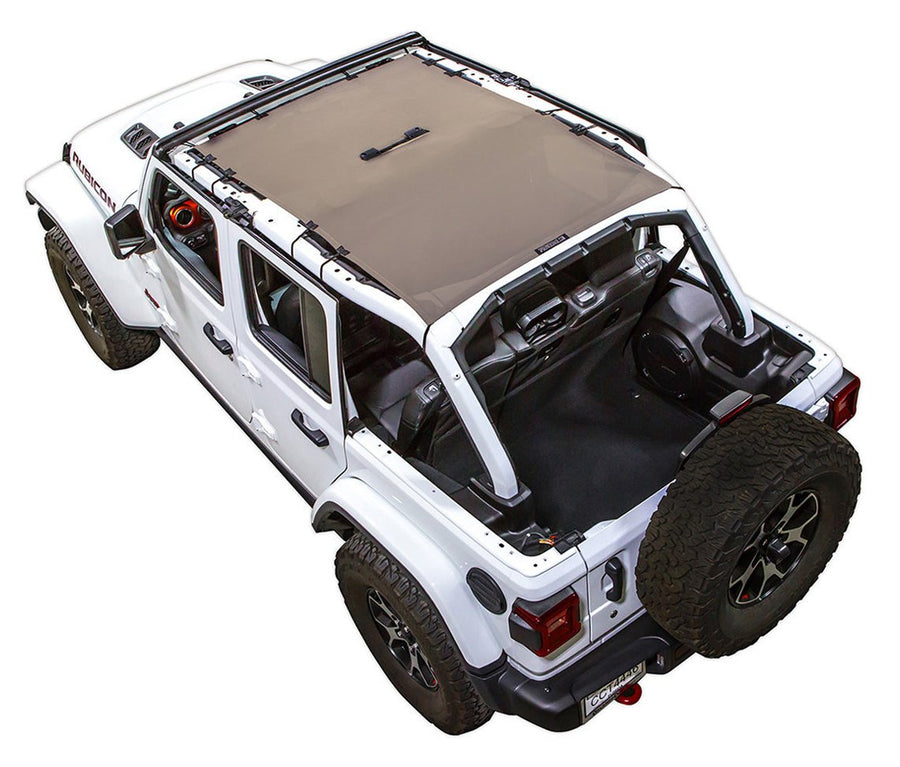 White Rubicon JL four door Jeep with tan SPIDERWEBSHADE shade on top that covers front and rear passenger seats.