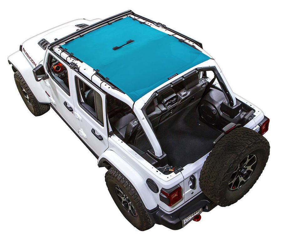White Rubicon JL four door Jeep with teal SPIDERWEBSHADE shade on top that covers front and rear passenger seats.