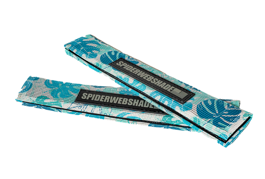 seat belt silencers with teal and blue Monstera Leafs on white mesh